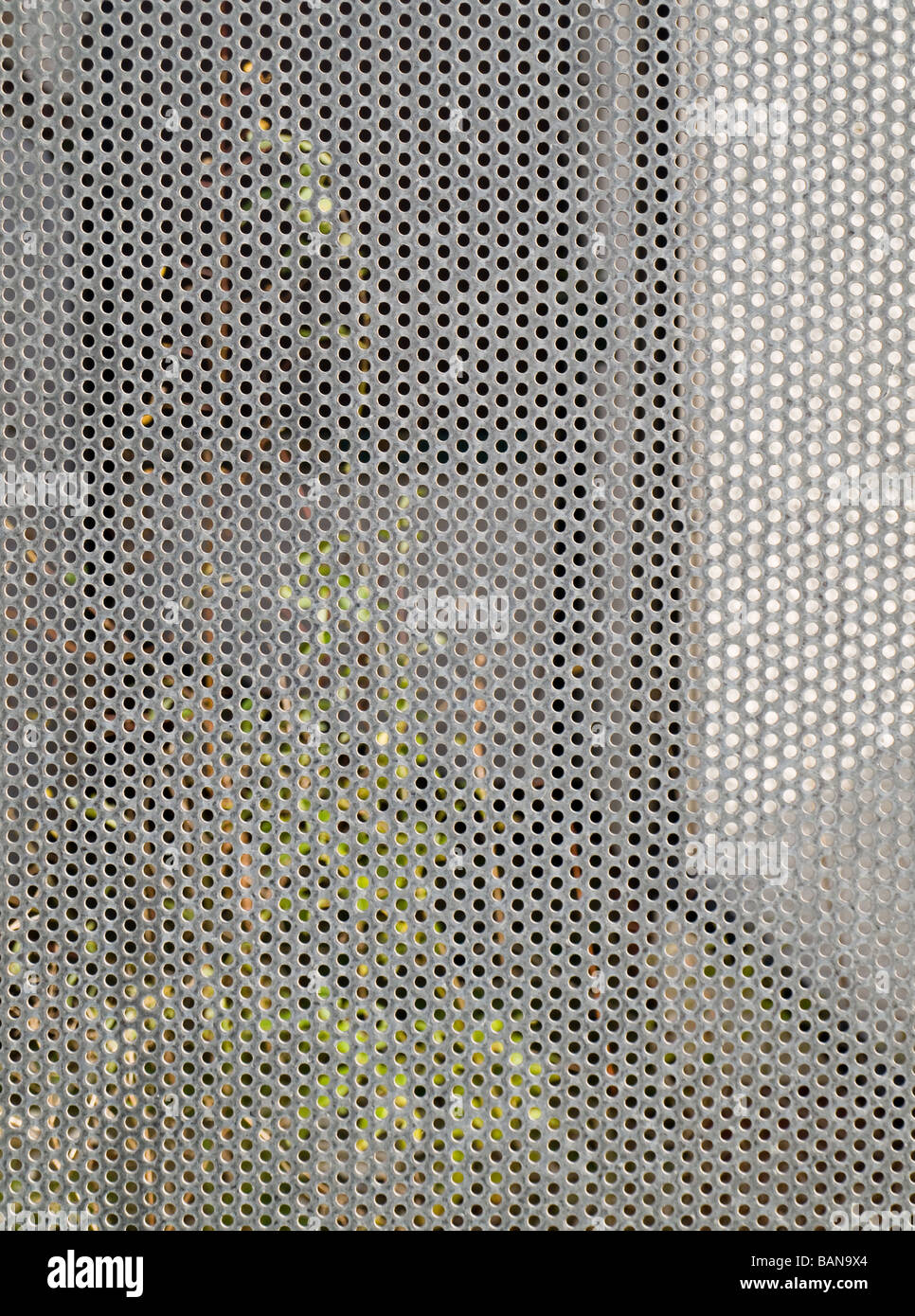 Cerchio reticolo metallico Pattern Texture di sfondo in grigio Foto Stock