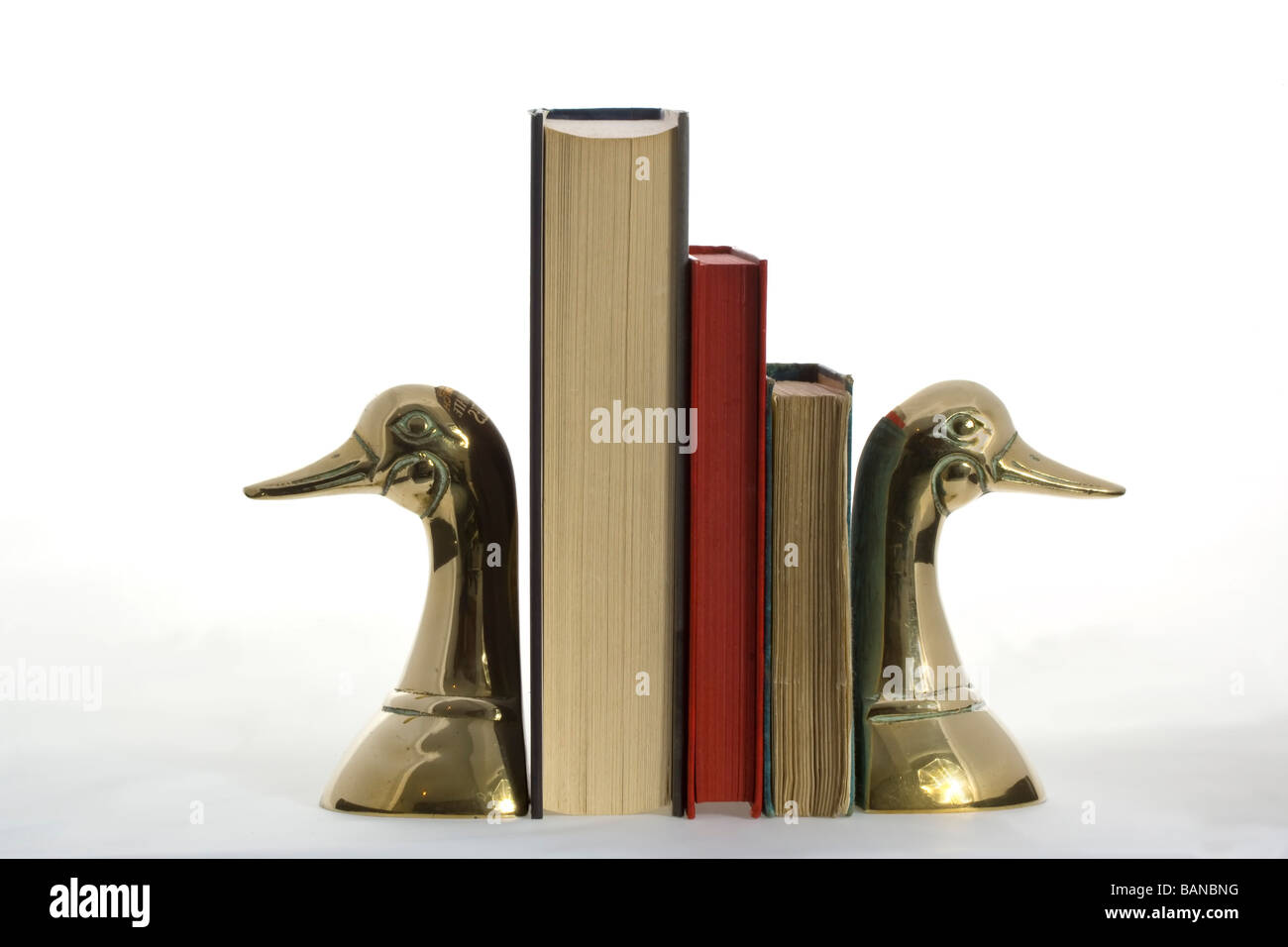 Ottone Bookends con libri Foto Stock