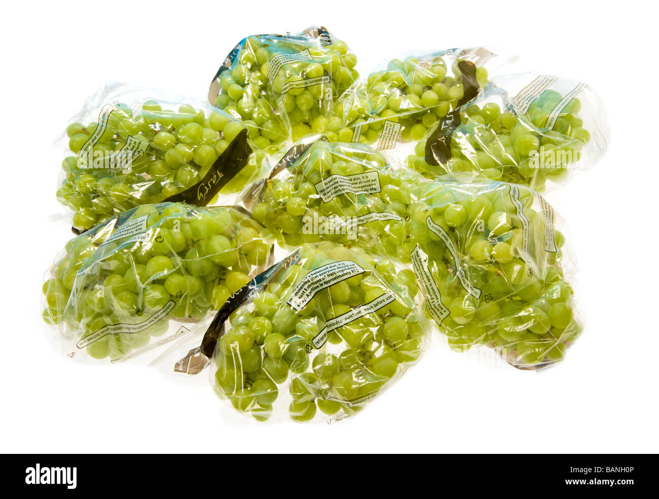 Qualità seedless tabella grappoli di uva pranzo pack box boxed vendere vendere avvolto avvolgere gli alimenti frutto di plastica salute sano verde giallo Foto Stock