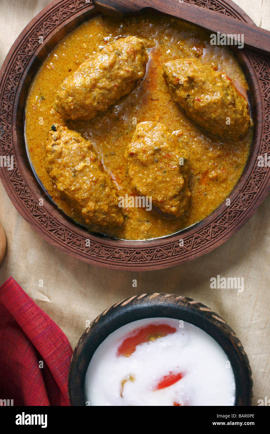 Machh montone kofta è un piatto del Kashmir fatta di fritte di montone tritata con spezie e cotta nel pomodoro saporita di sugo di cipolla Foto Stock