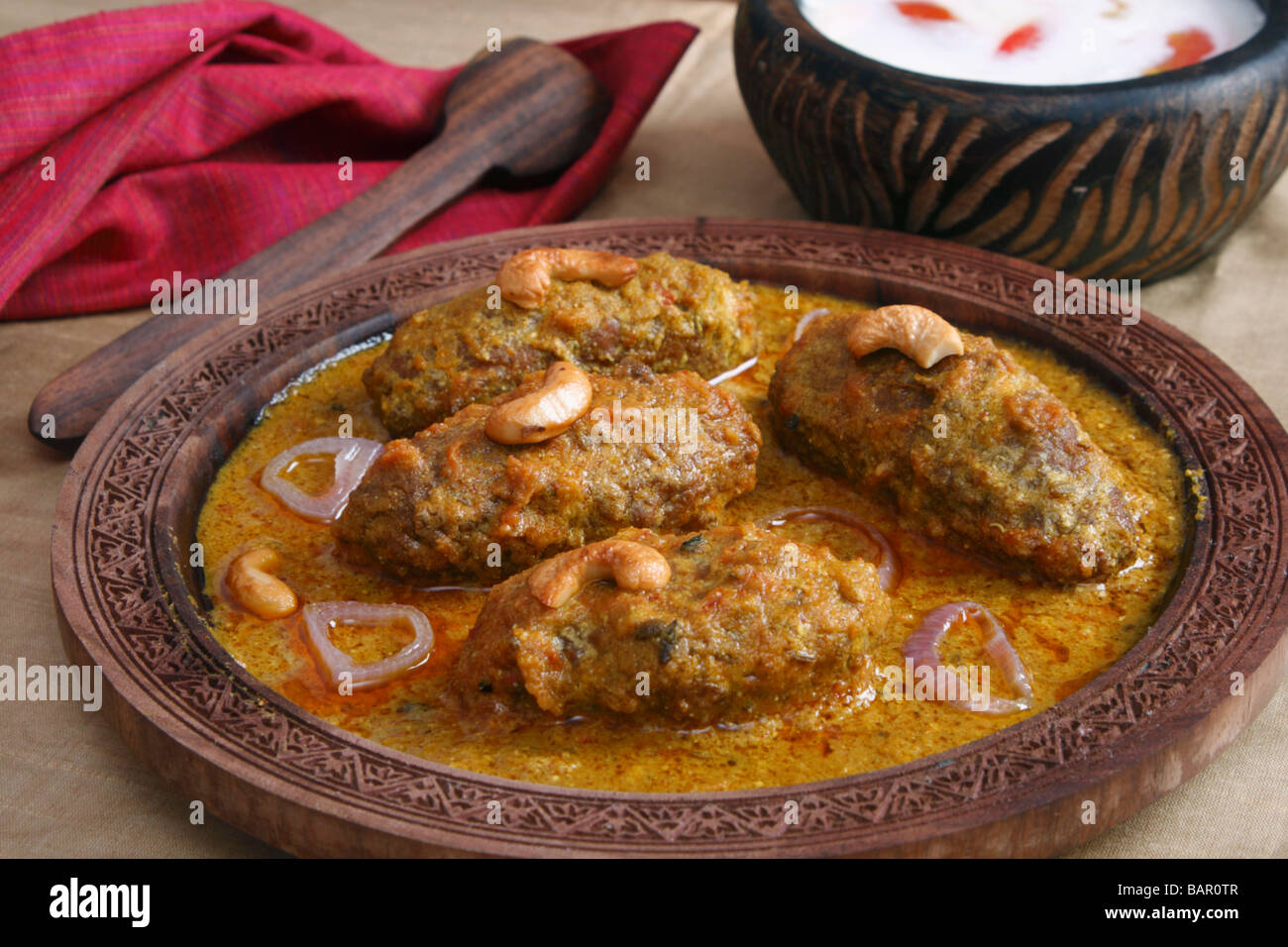 Machh montone kofta è un piatto del Kashmir fatta di fritte di montone tritata con spezie e cotta nel pomodoro saporita di sugo di cipolla Foto Stock