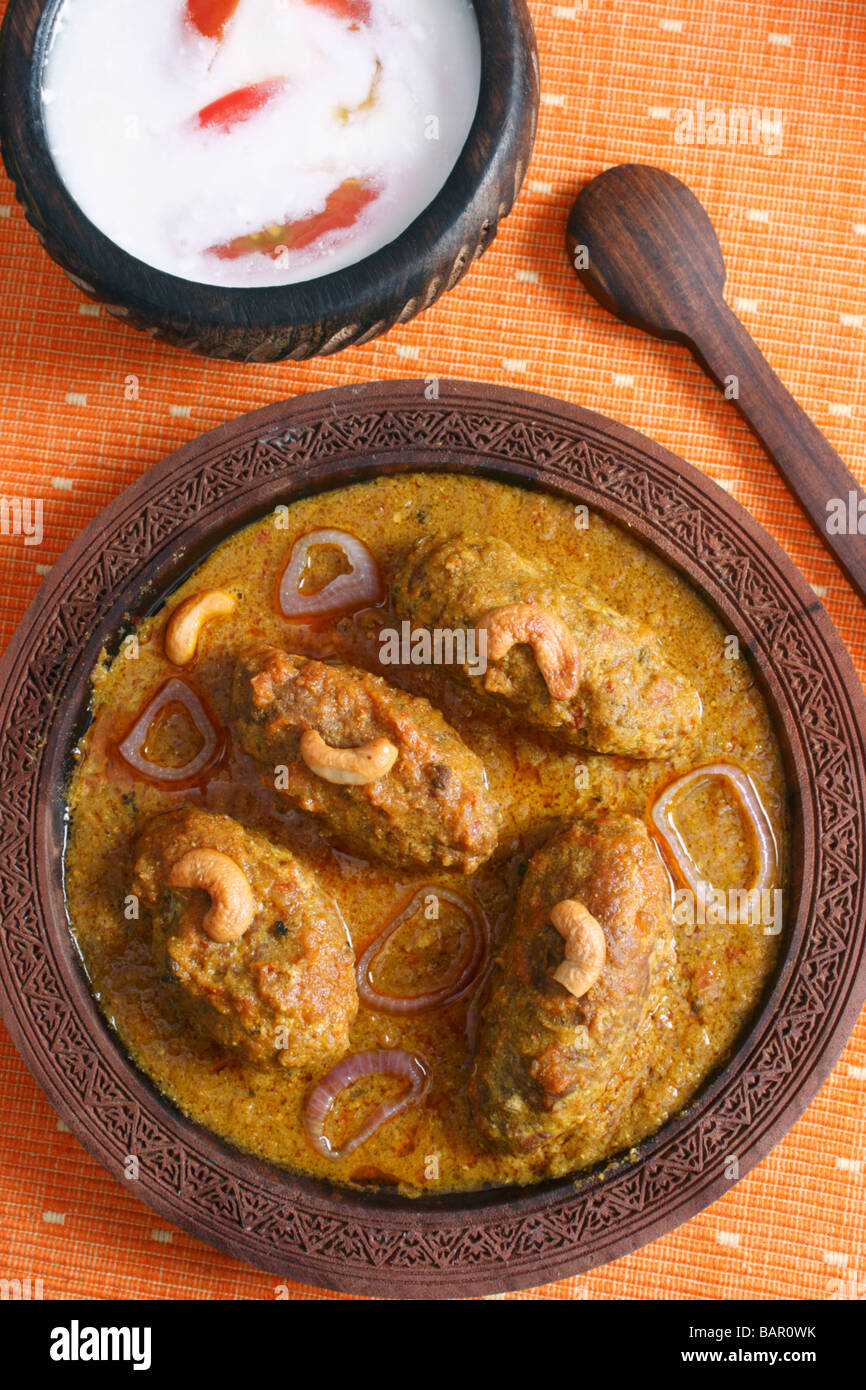 Machh montone kofta è un piatto del Kashmir fatta di fritte di montone tritata con spezie e cotta nel pomodoro saporita di sugo di cipolla Foto Stock