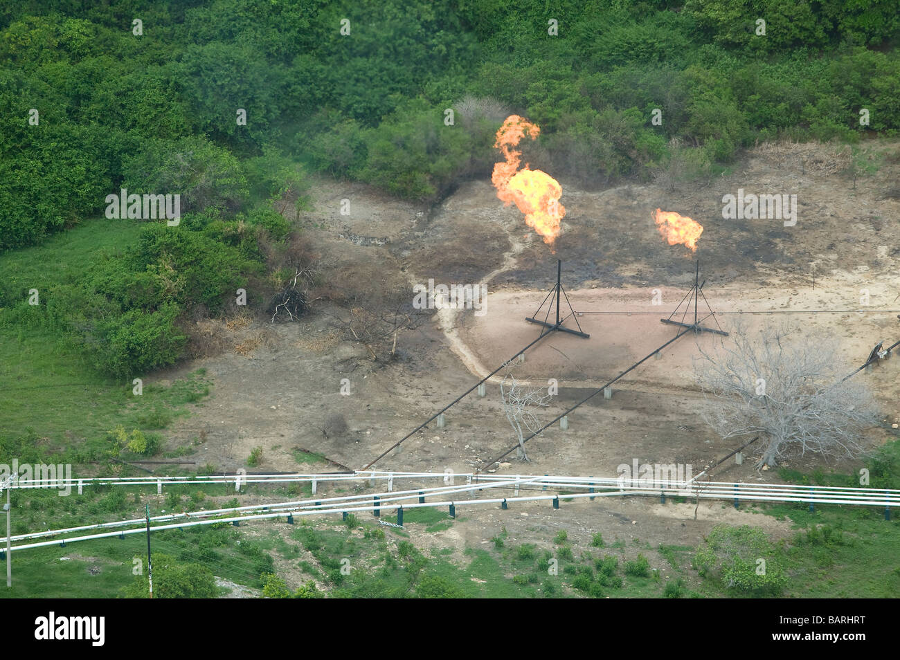 Vista aerea sopra PEMEX gas naturale gasdotti di trasmissione di pile di svasatura nel nordest del Messico Foto Stock