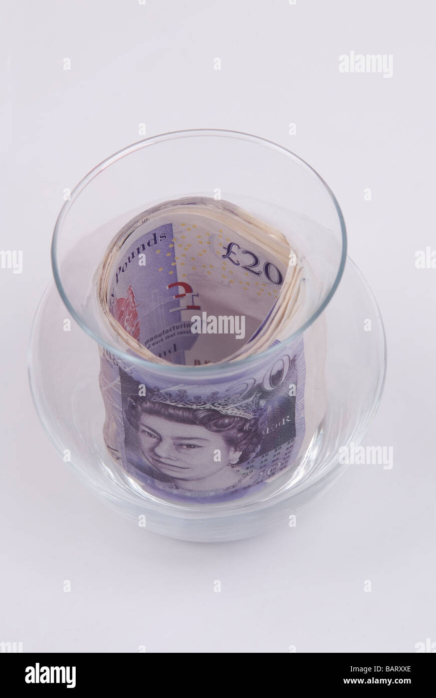 Il denaro all'interno di un vaso Foto Stock