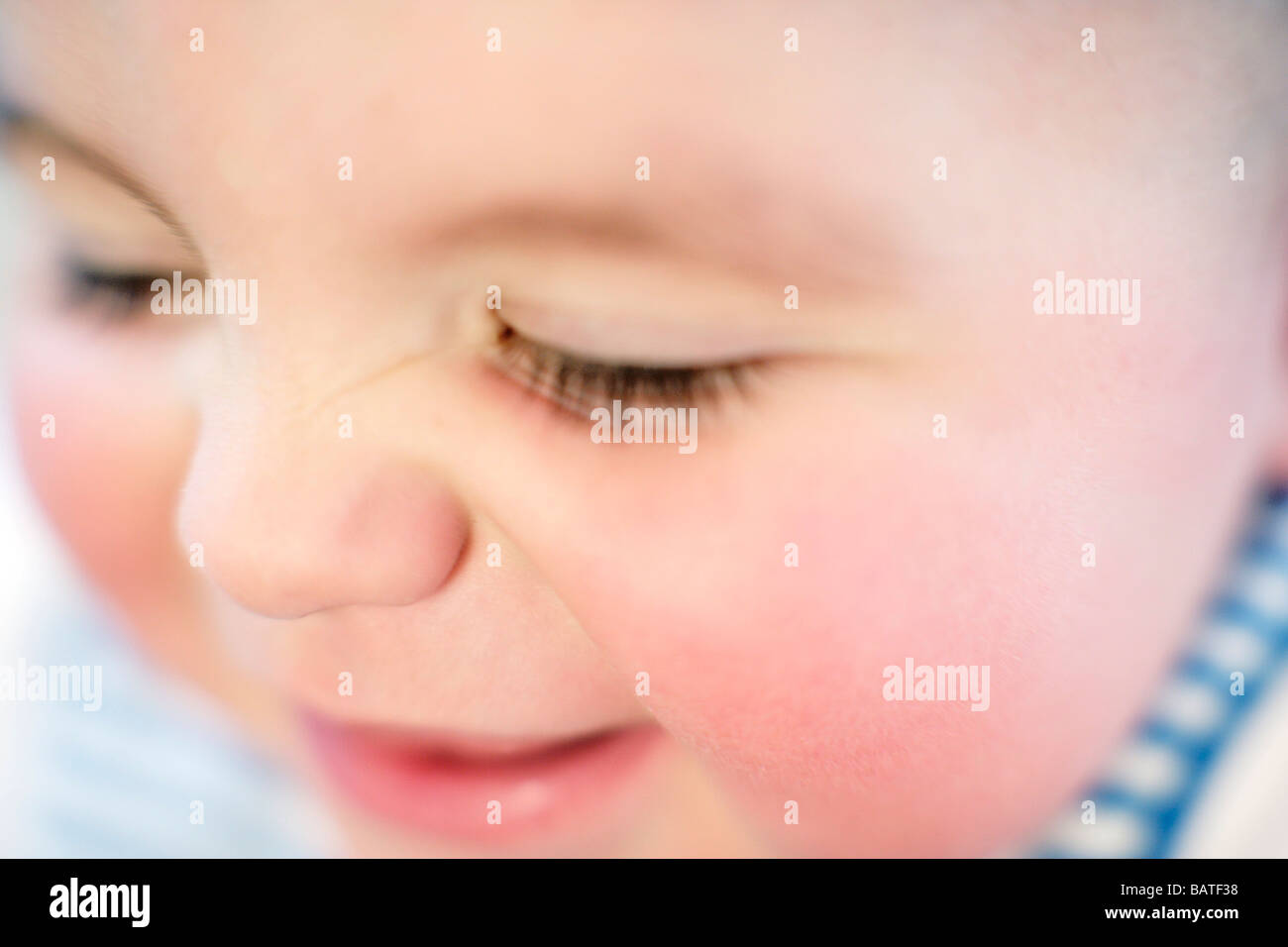 Baby boy. Close-up di un bambino del viso. Egli è di circa nove mesi di età. Foto Stock