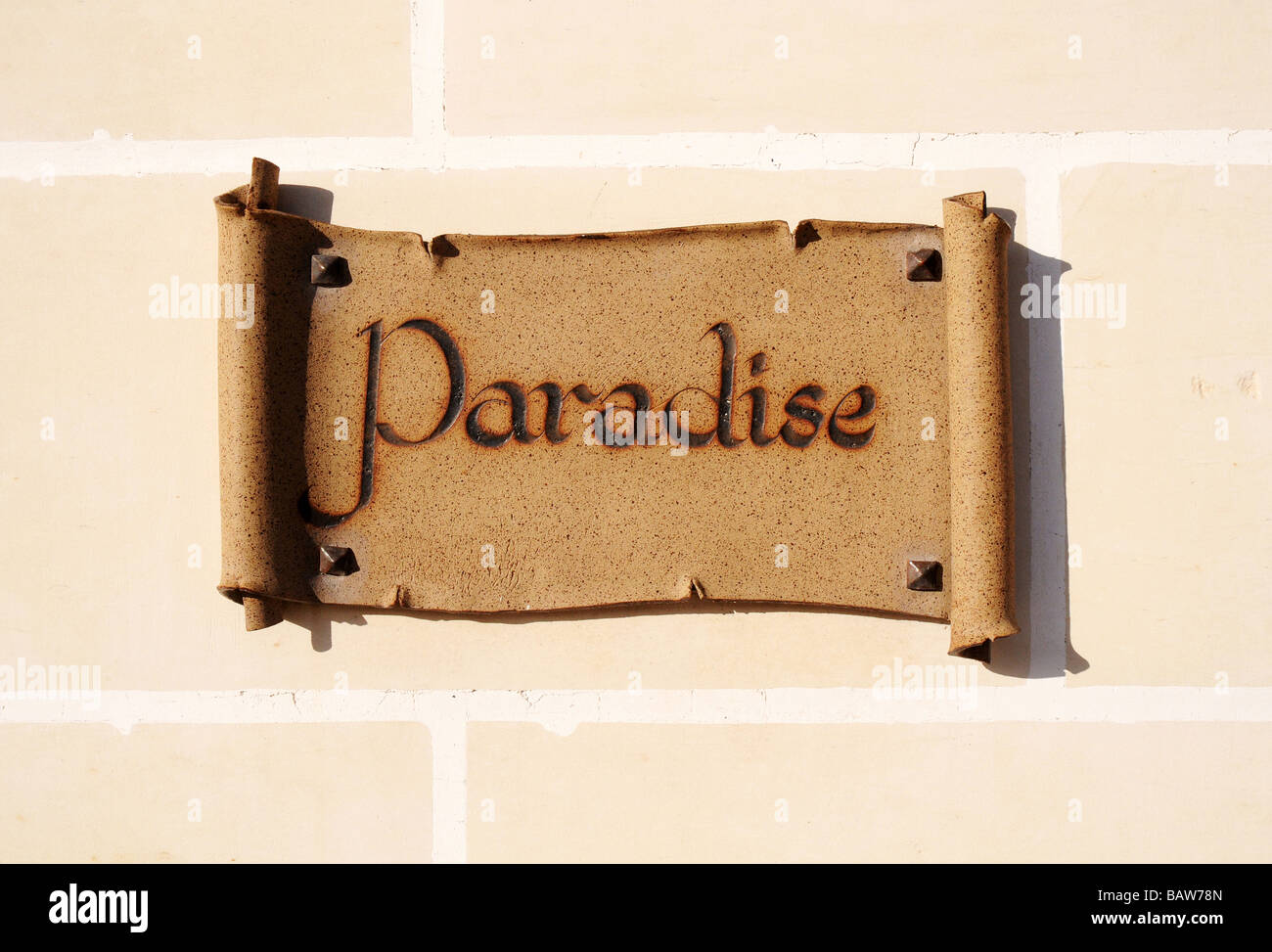 Lettura del segno Paradise Foto Stock