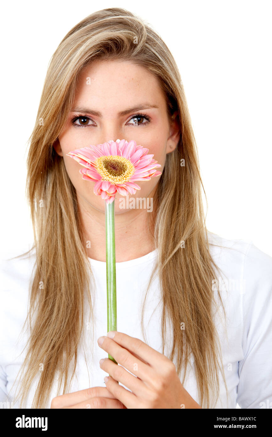 Donna con un fiore Foto Stock