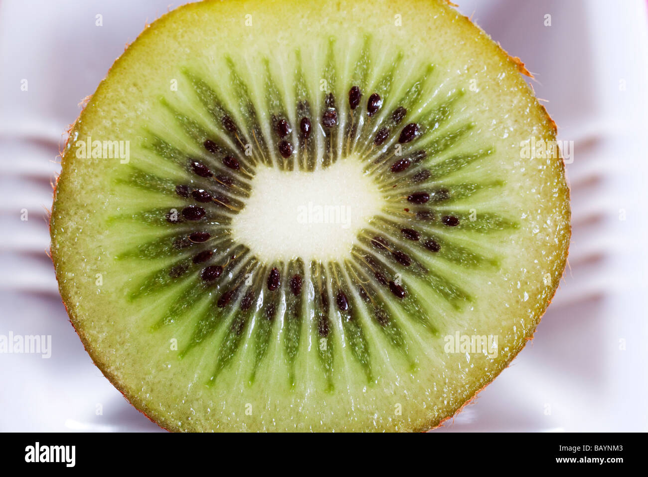 Mezza kiwi dessert di frutta. Close up Foto Stock