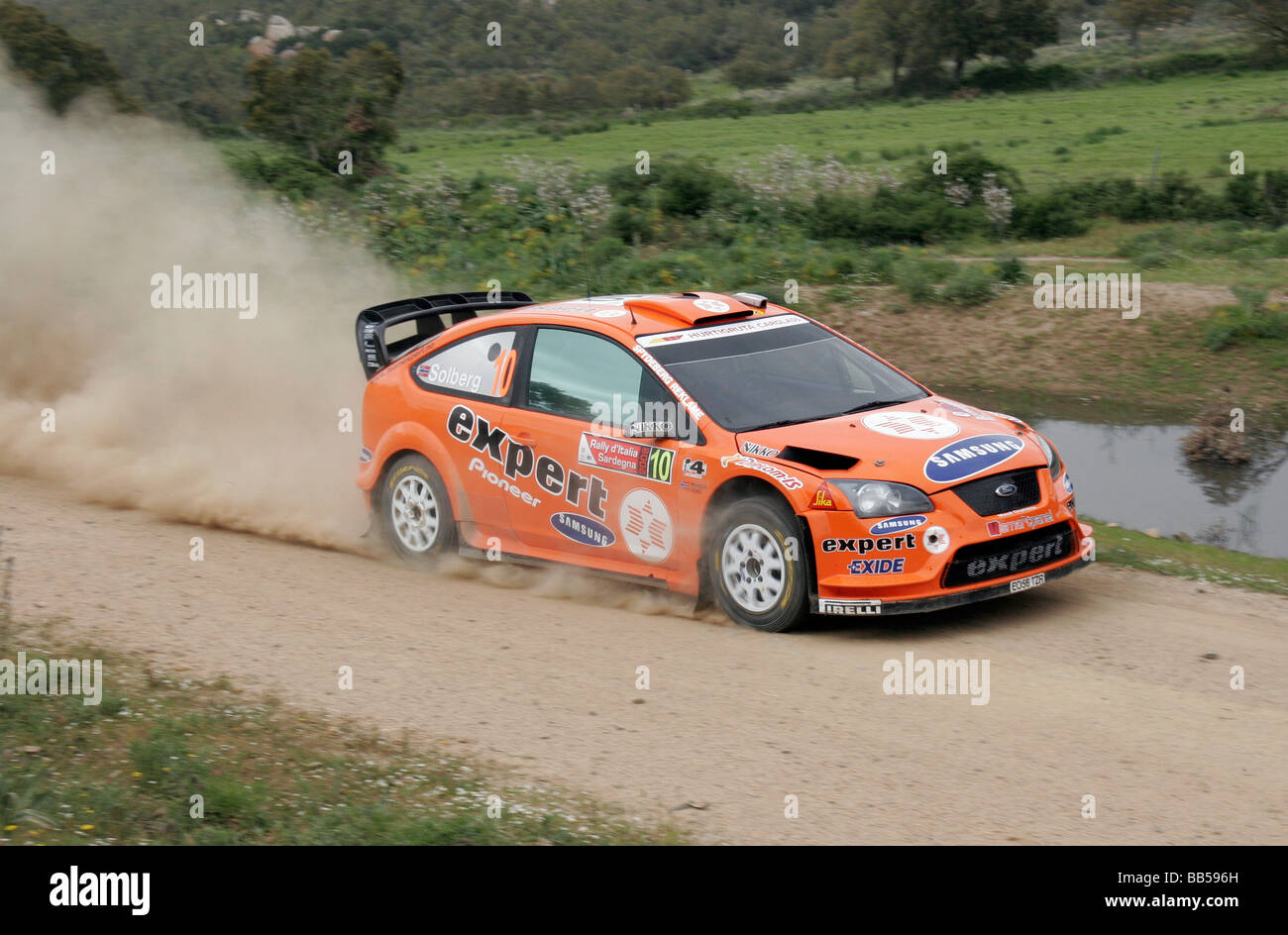 Driver norvegese Henning Solberg e Cato Menkerud alla guida di una Ford Focus a Sardinia World Rally Championship nel 2008 Foto Stock