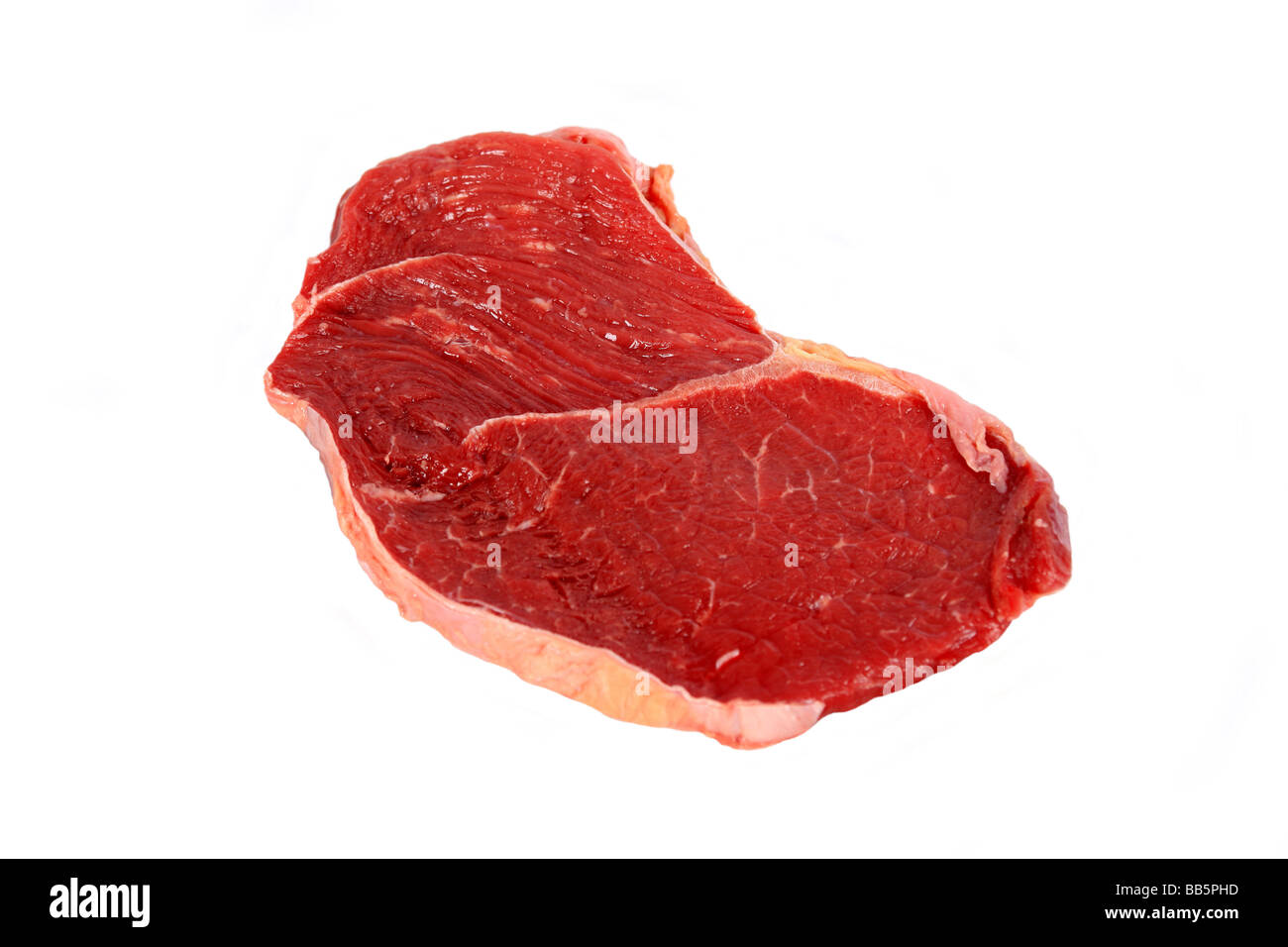 Pezzo di materie bistecca carne contro uno sfondo bianco Foto Stock