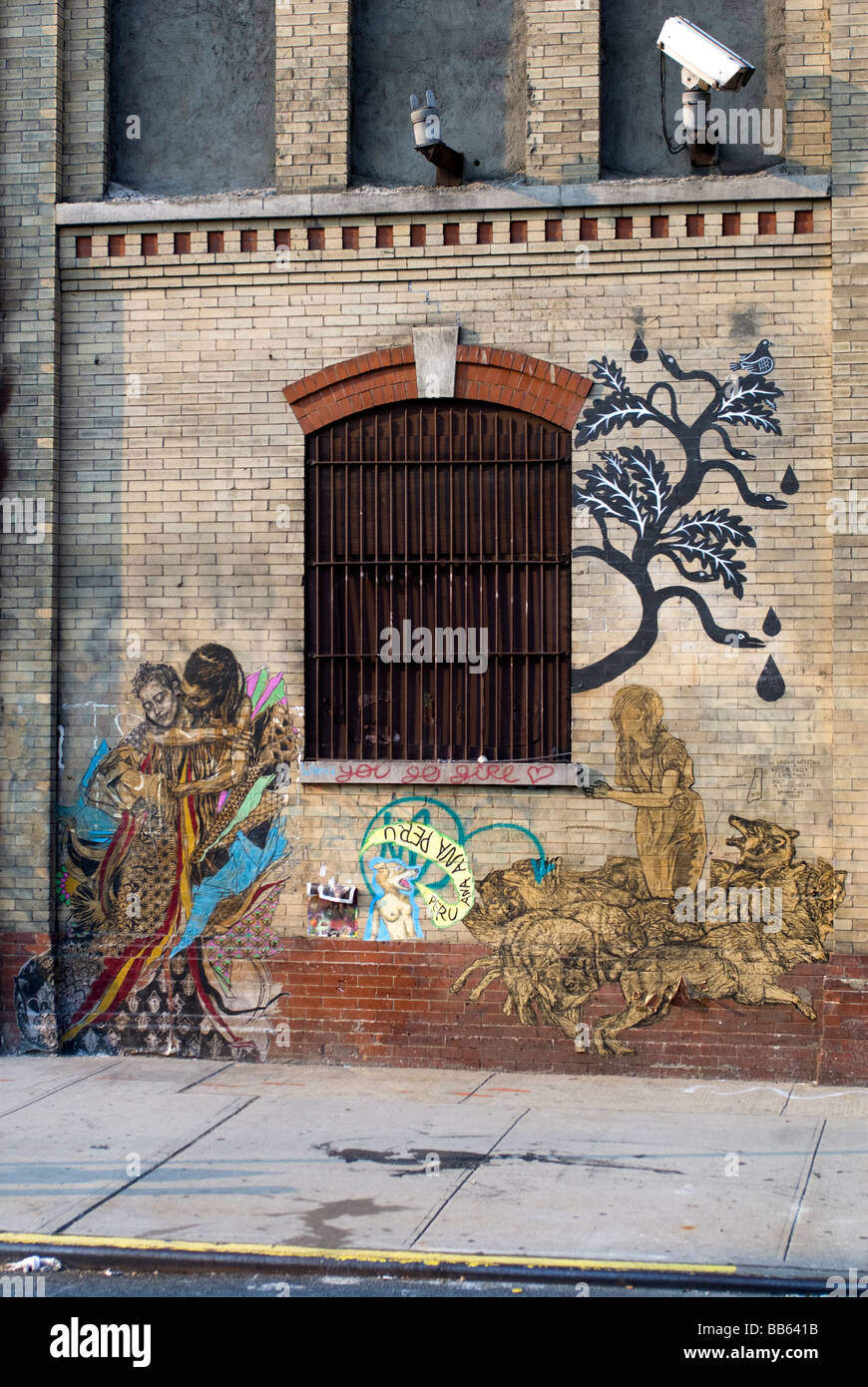 Arte di strada adorna una parete nel quartiere Chelsea di Manhattan a New York City. © Craig M. Eisenberg Foto Stock