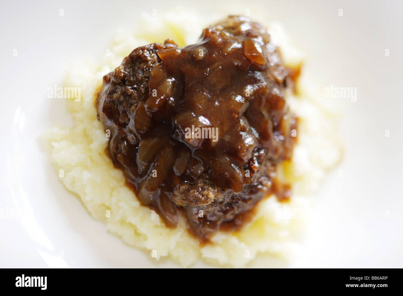 Purea di patate con carne di manzo e salsa di cipolle Foto Stock