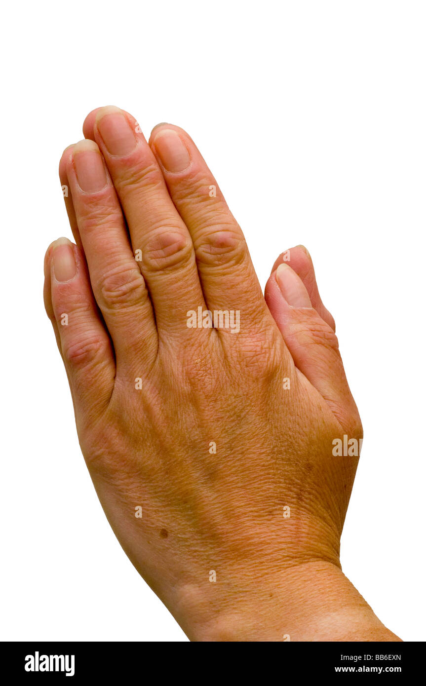 Womans le mani in preghiera Foto Stock