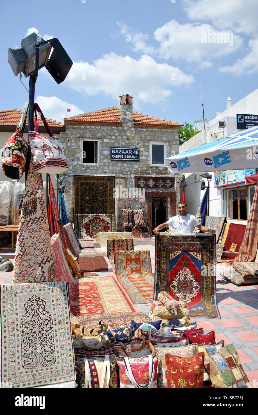 Negozio di tappeti dal porto, Marmaris, Datca Peninsula, Provincia Mulga, Turchia Foto Stock