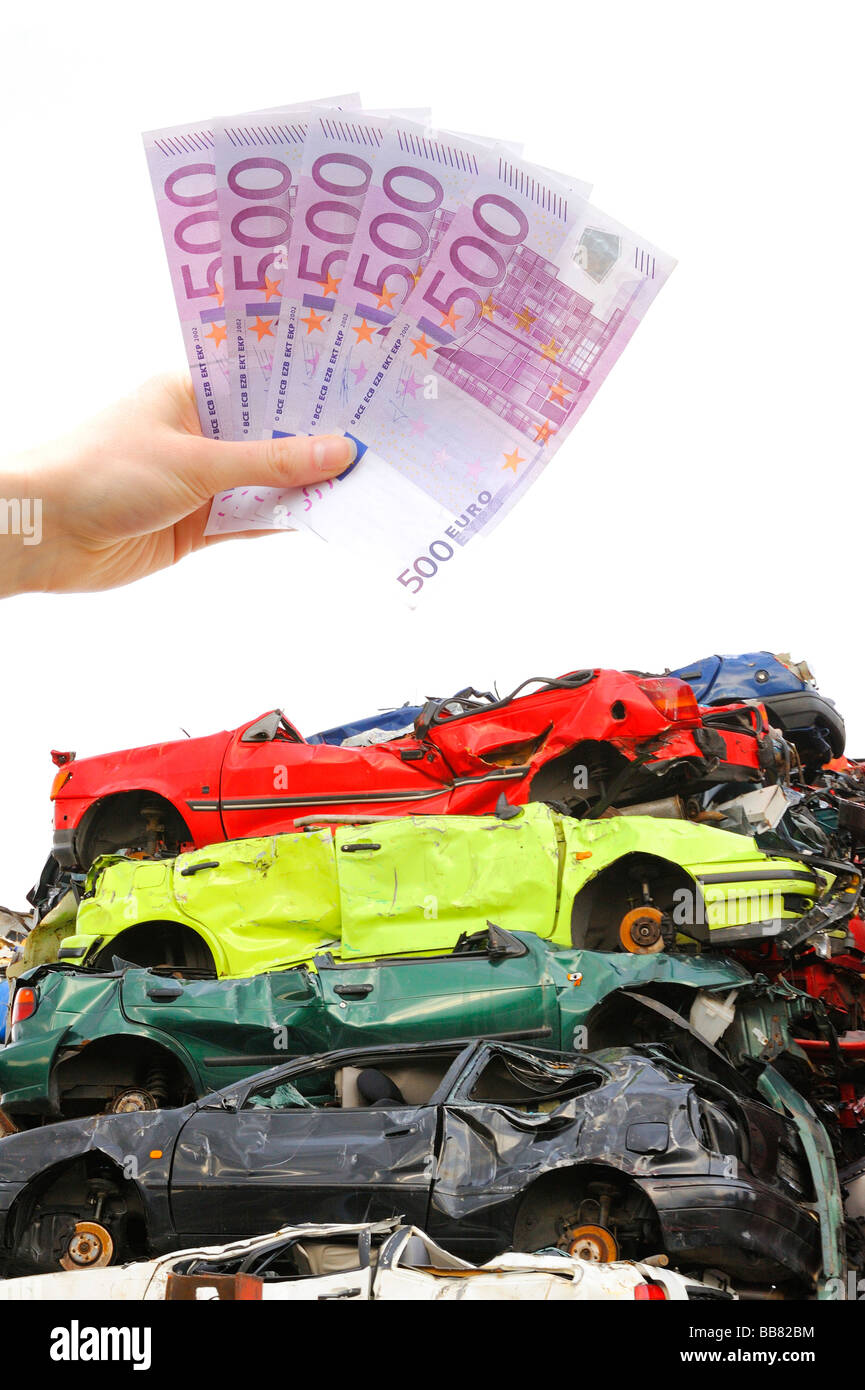 Junk cars, banconote, immagine simbolica per il premio di demolizione Foto Stock