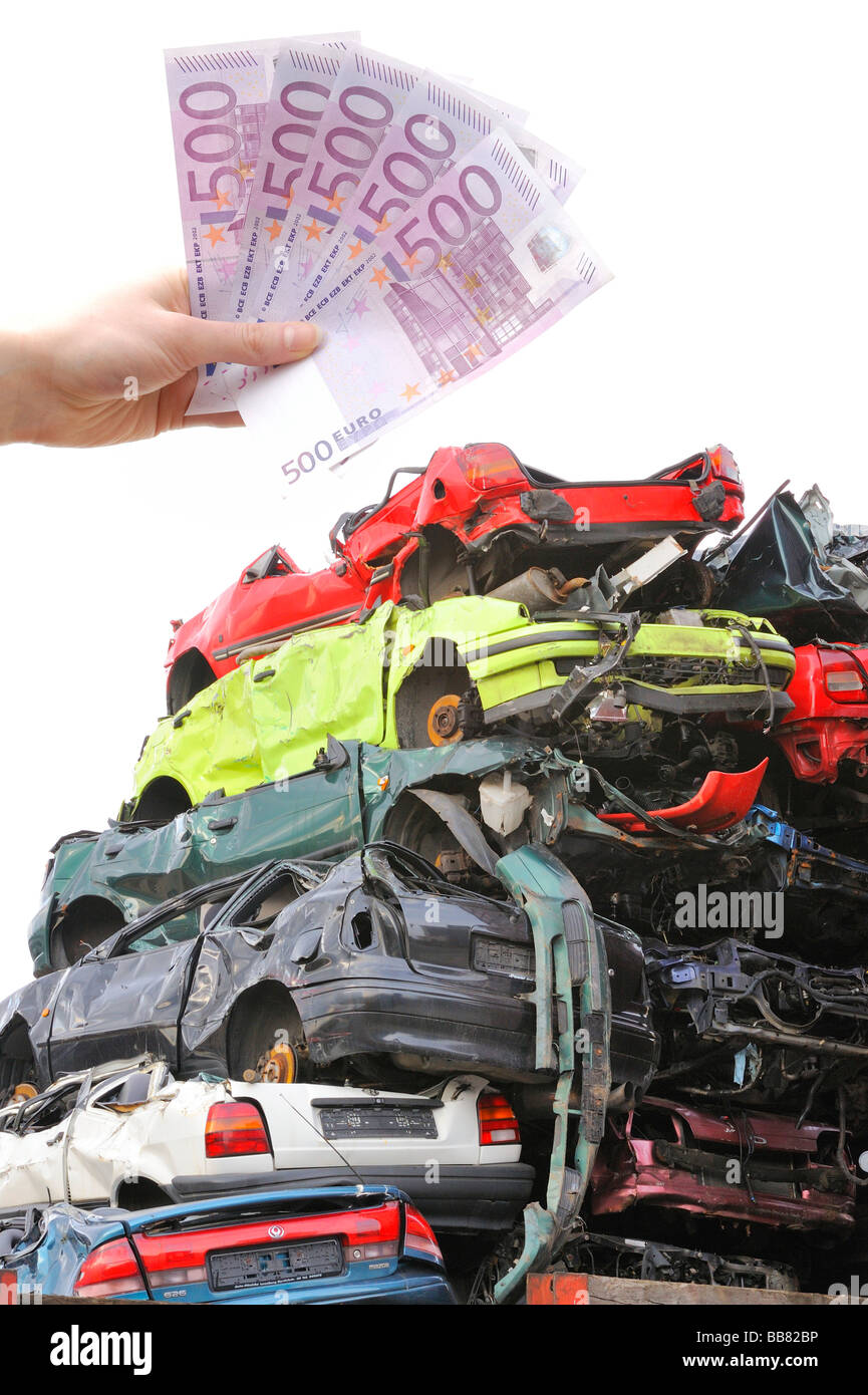 Junk cars, banconote, immagine simbolica per il premio di demolizione Foto Stock