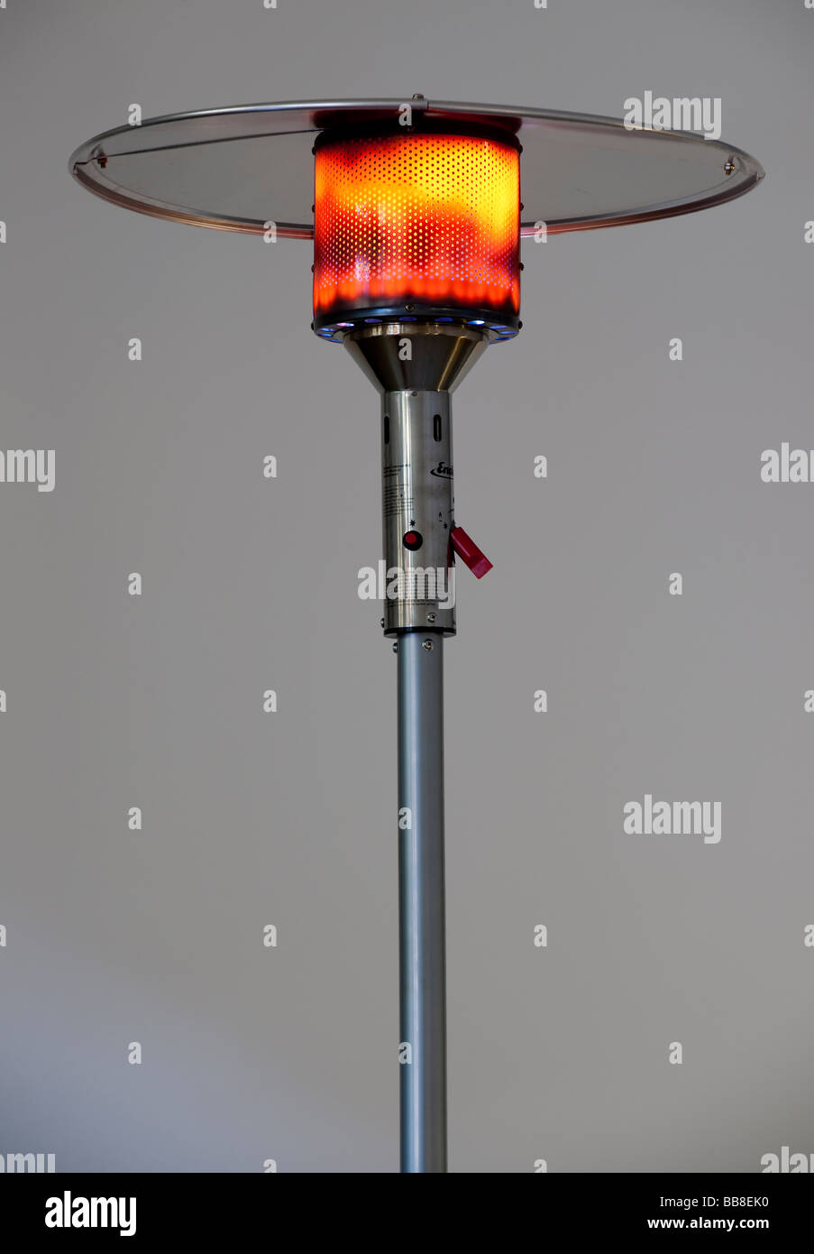 Red hot-bruciatore a gas di un Ombrellone riscaldante Foto Stock