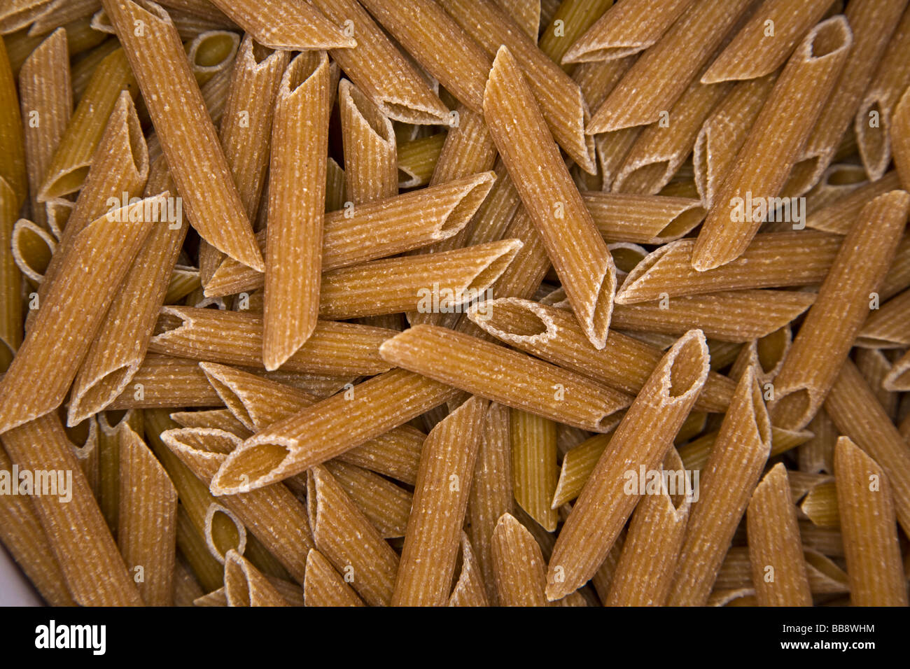 Penne "pasta di grano intero' brown Foto Stock