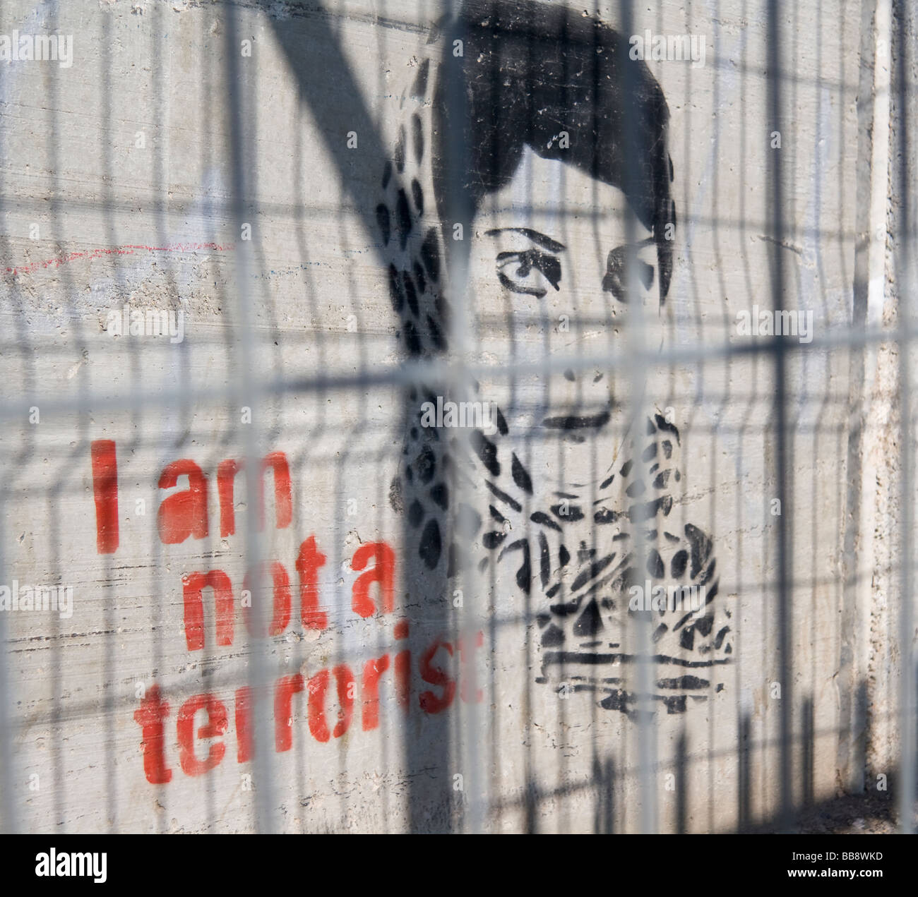 Un graffito sulla parete di separazione, Palestina Foto Stock