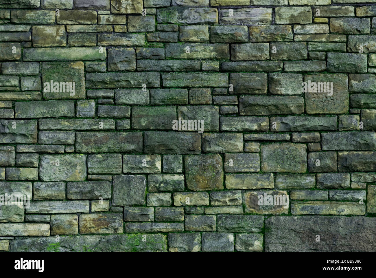 Un muro in pietra naturale mattoni Foto Stock