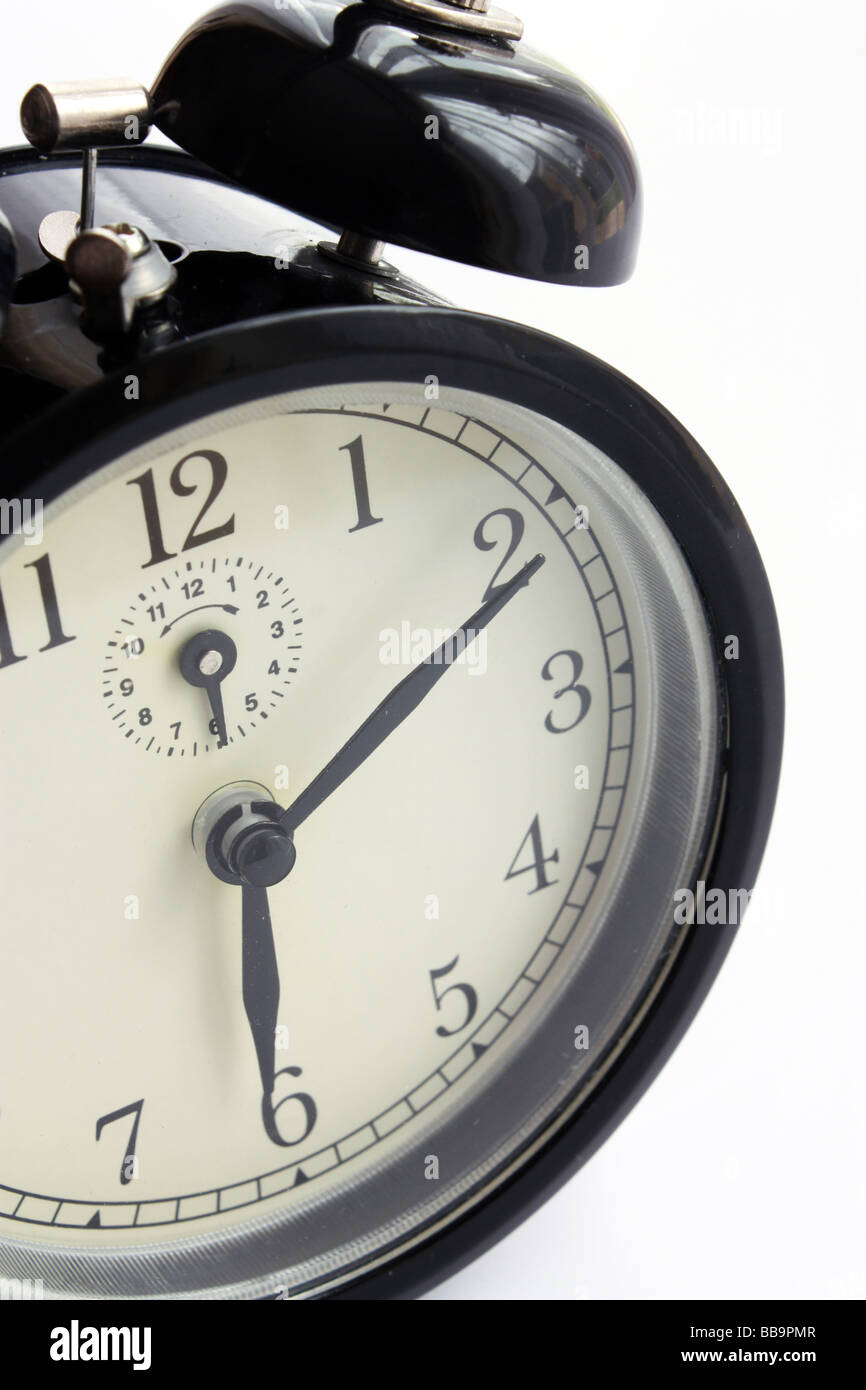 Un allarme colpo di clock in bianco e nero Foto Stock