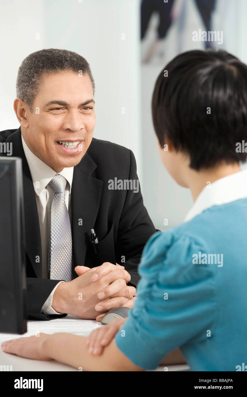 Il servizio clienti cordiale Foto Stock