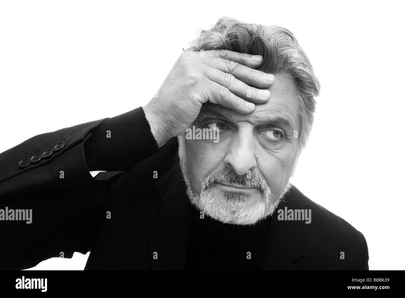 L'uomo con la mano sulla sua testa mal di testa Foto Stock