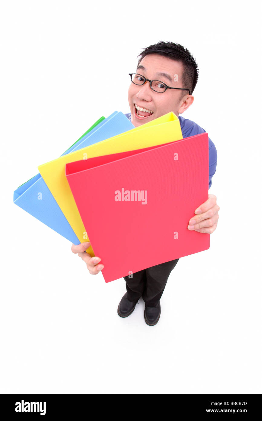 Imprenditore multi portante cartelle colorate Foto Stock