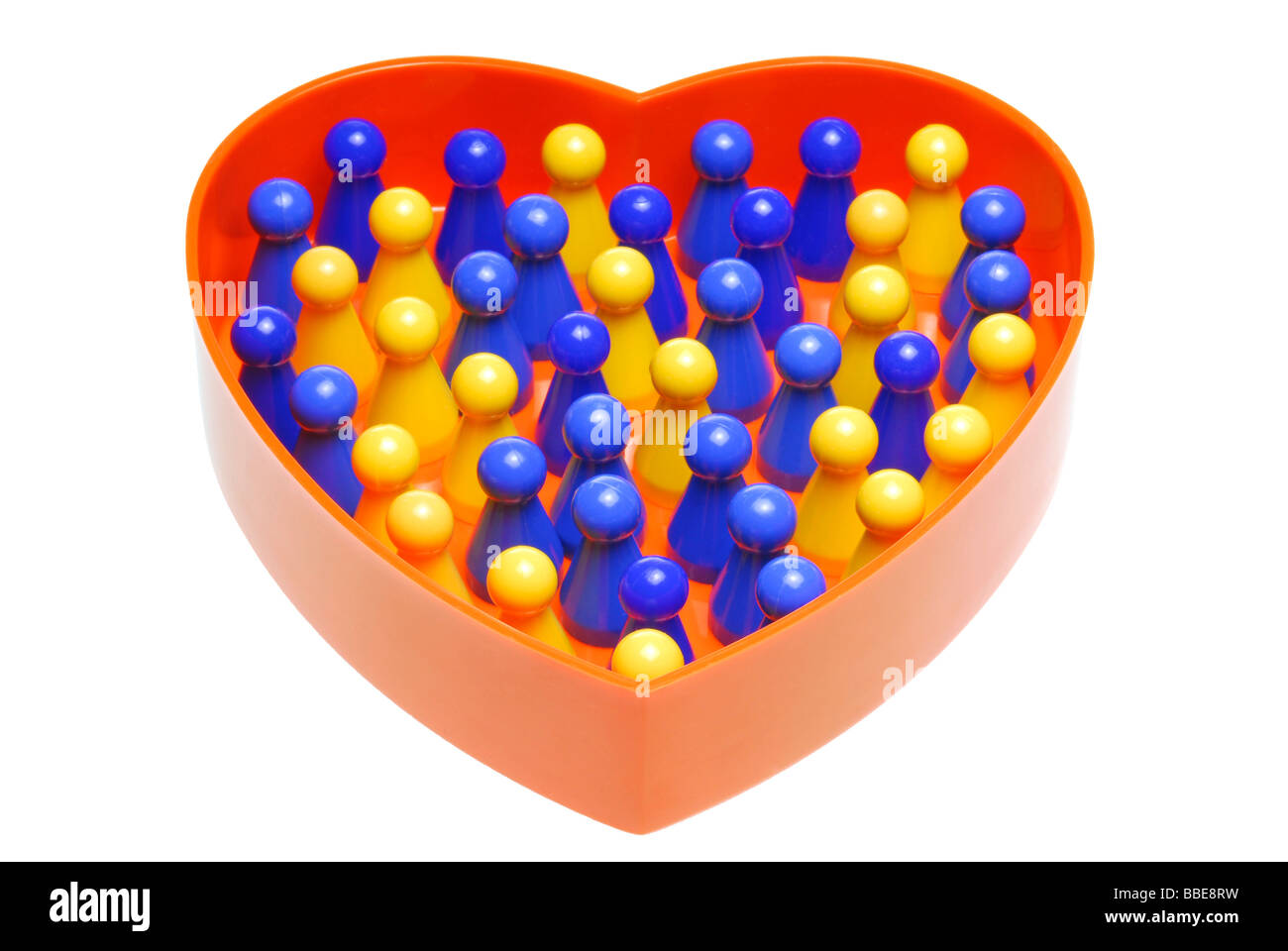 A forma di cuore con contenitore meeples in due colori, immagine simbolica di "ricerca di partner" Foto Stock