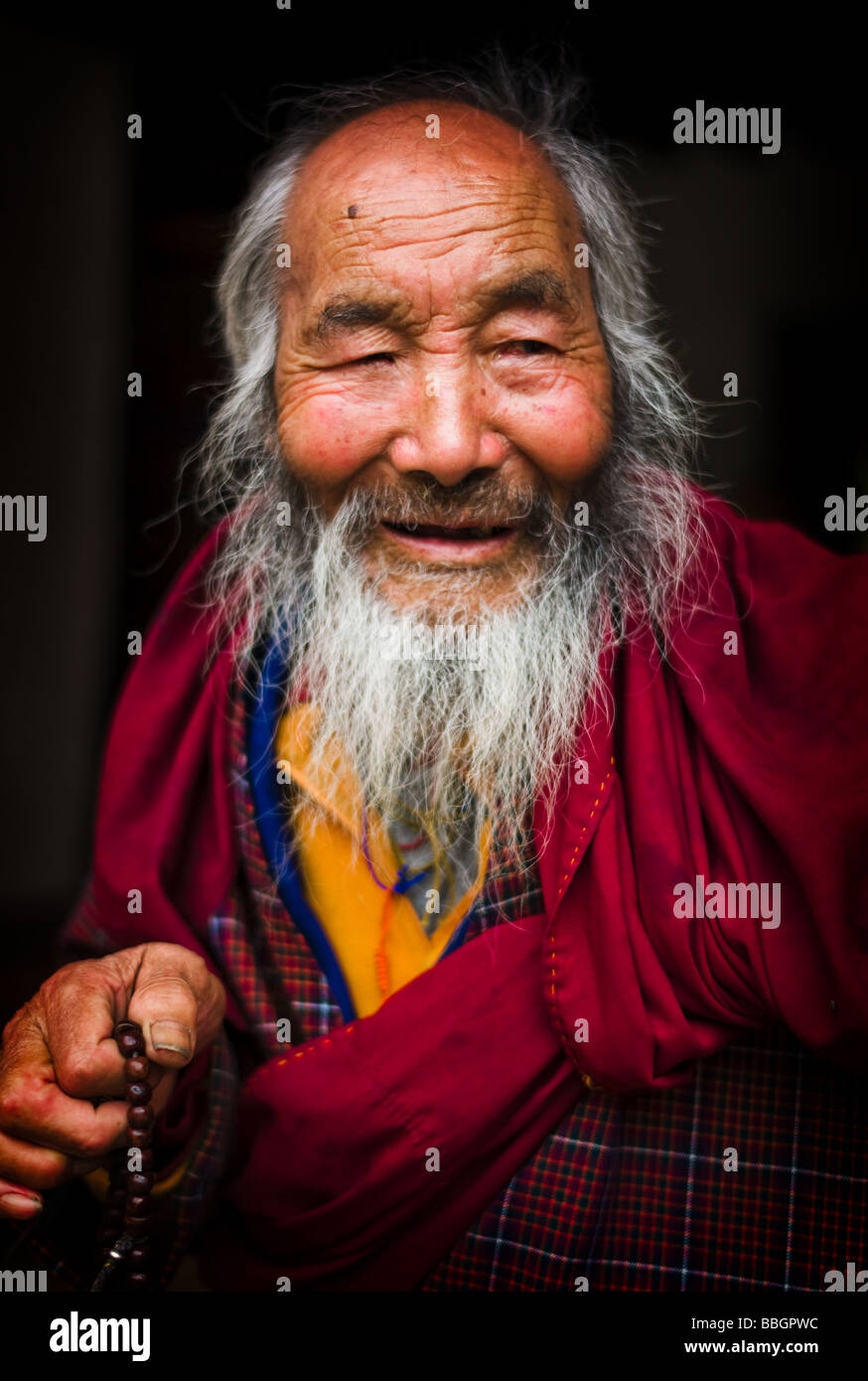 Ritratto di un vecchio monaco - Bhoutan Foto Stock