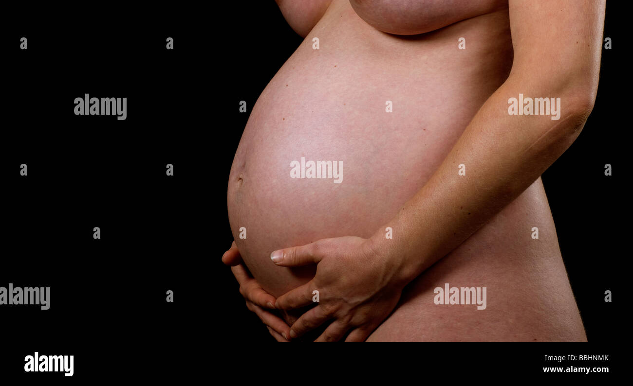 A 7 mesi di gravidanza pancia Foto stock - Alamy