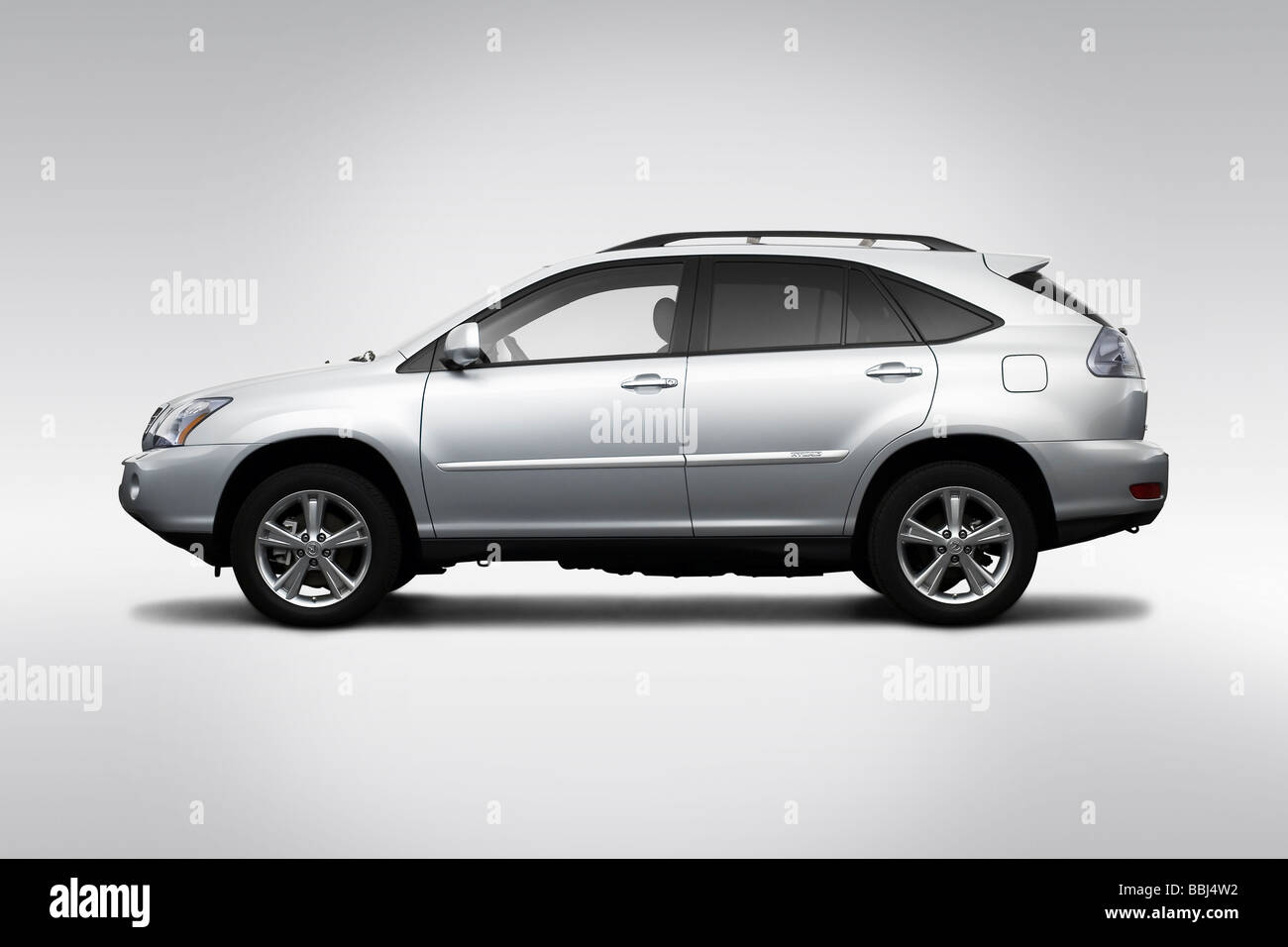 2009 Lexus RX Hybrid RX400h in argento - Driver Profilo laterale Foto Stock