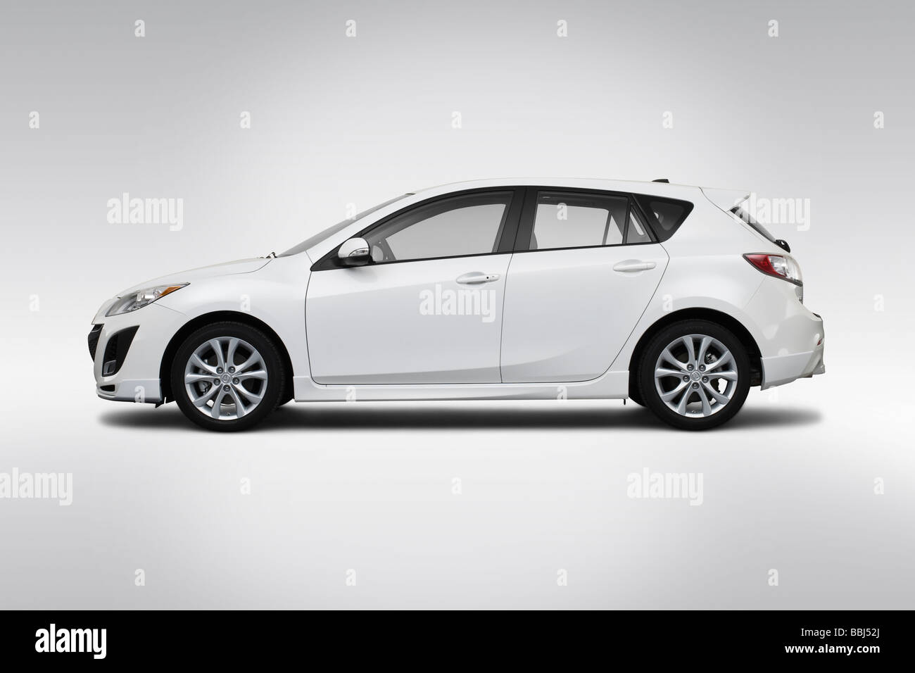 2010 Mazda MAZDA3 Grand Touring in bianco - Driver Profilo laterale Foto Stock