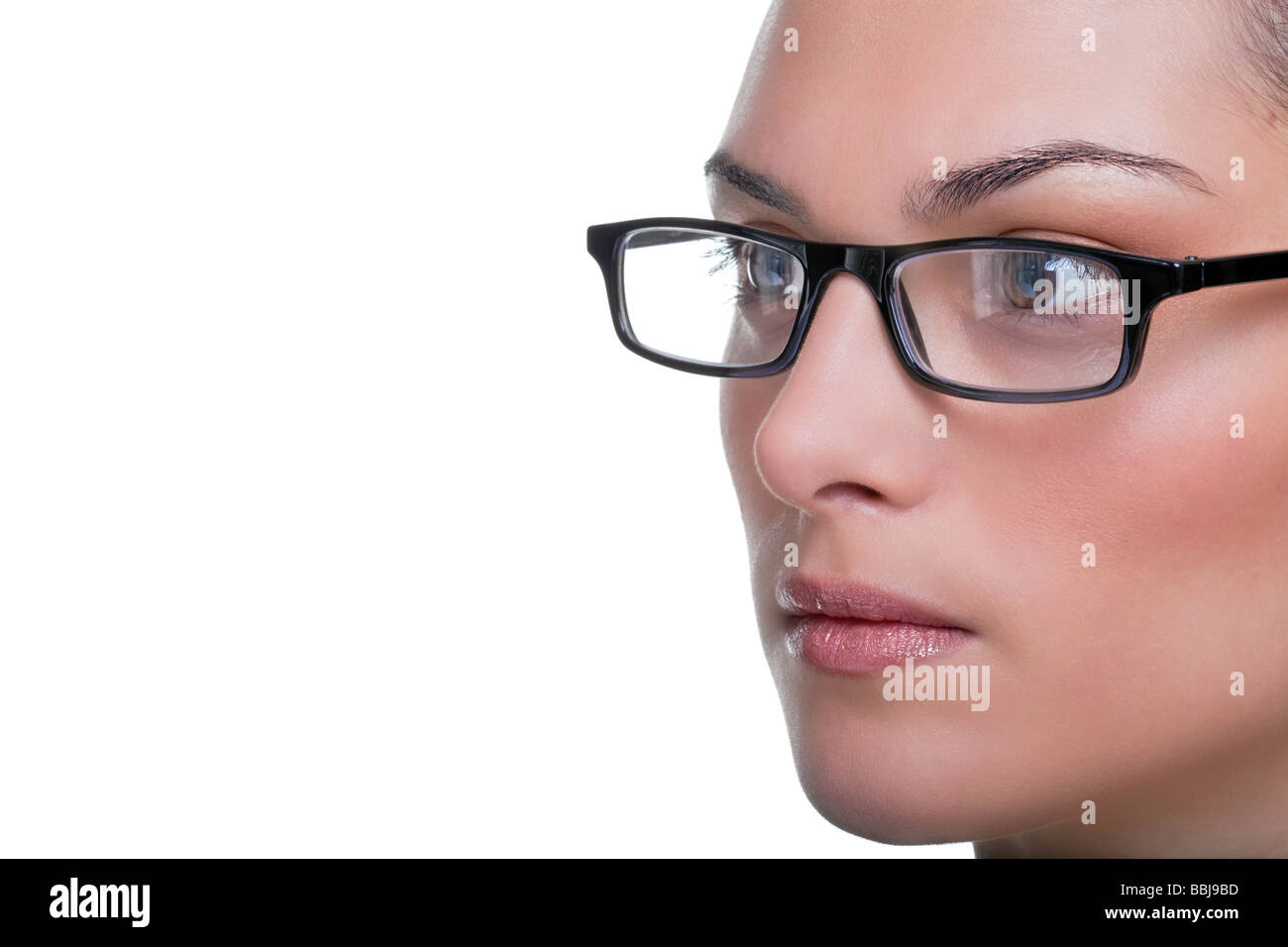 Close up volto ritratto di una donna che indossa gli occhiali Foto Stock