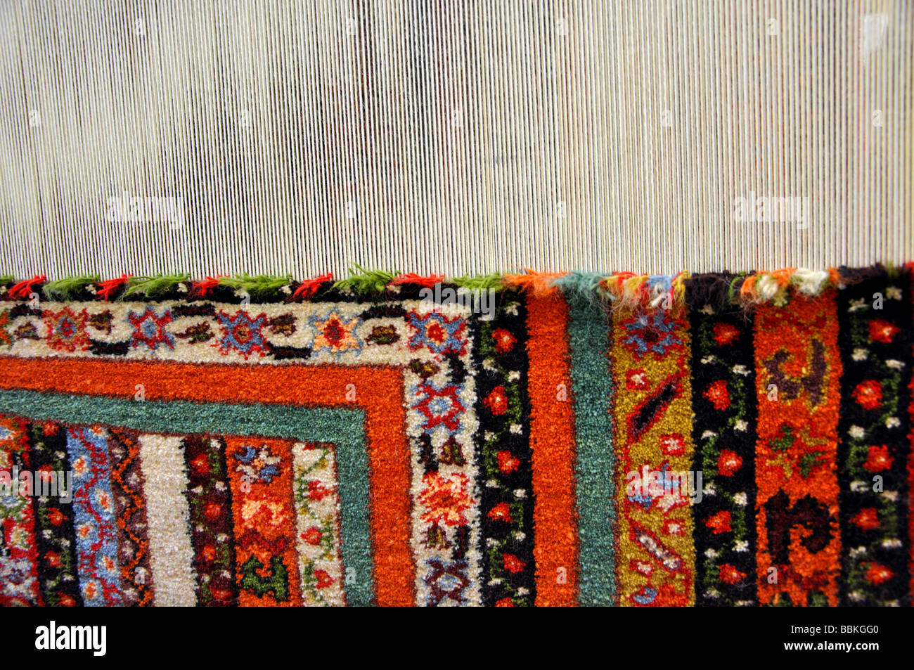 Close-up del telaio in fabbrica di tappeti, Denizli, Denizli Provincia, Turchia Foto Stock