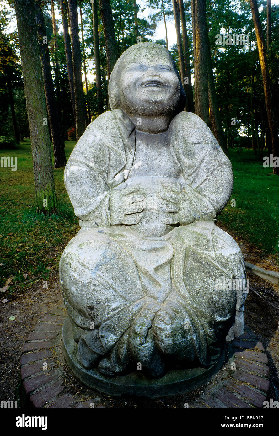 La scultura Der Bronzetto des umori da Bernhard Hoetger, ridendo Buddha, Worpswede, Bassa Sassonia, Germania, Europa Foto Stock