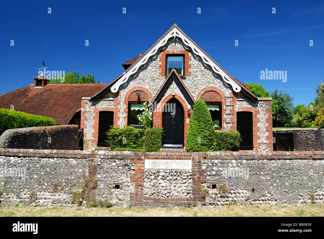 Un old school house ora una casa privata Foto Stock