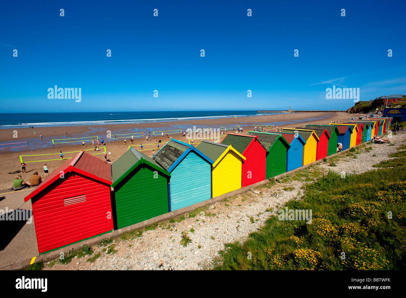 Cabine sulla spiaggia, Whitby Foto Stock