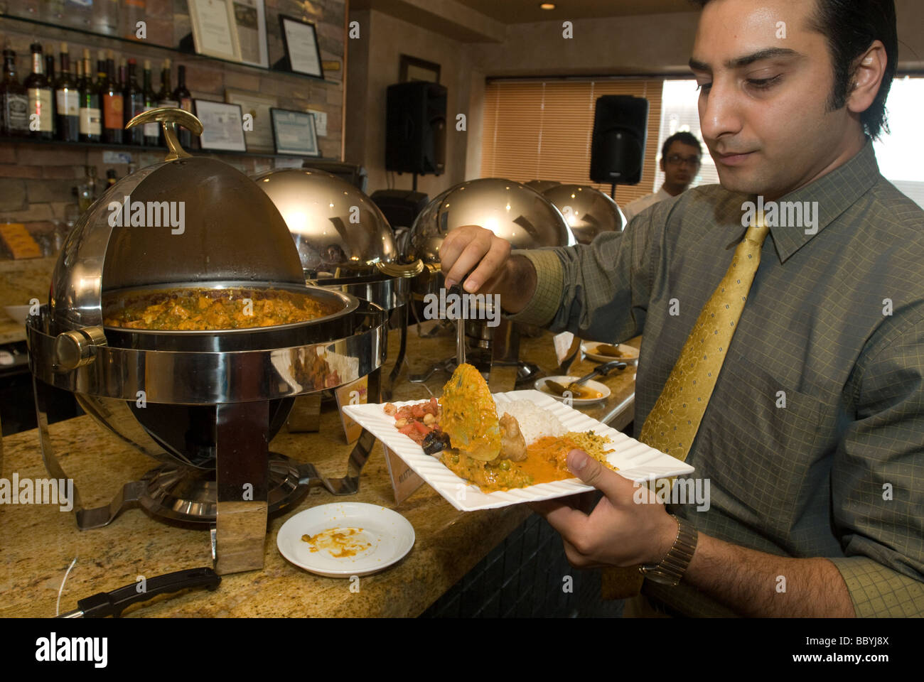 Il curry e altre prelibatezze Indiane sono serviti a Delhi Heights Restaurant in Jackson Heights quartiere di New York Foto Stock