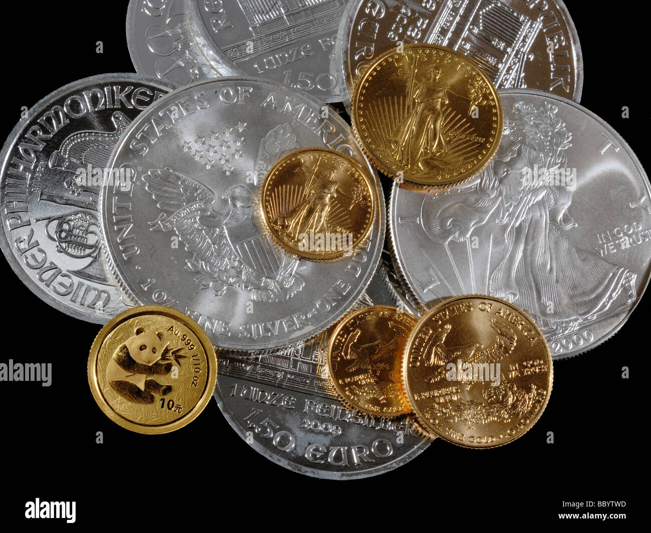 Argento e monete d'Oro Foto Stock
