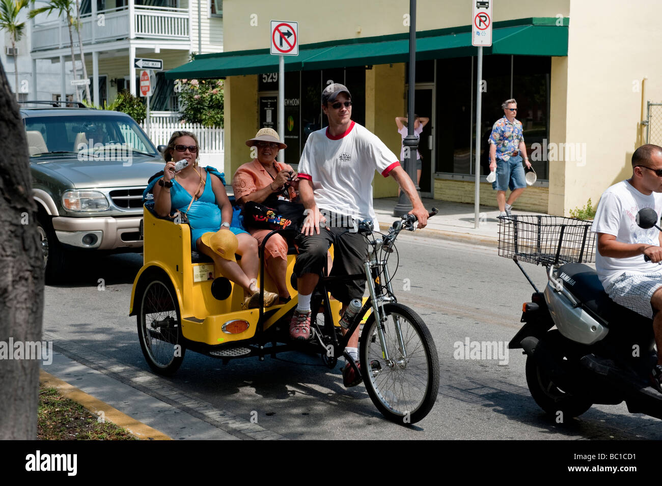 Taxi bicicletta con passeggeri a Key West Florida Foto Stock
