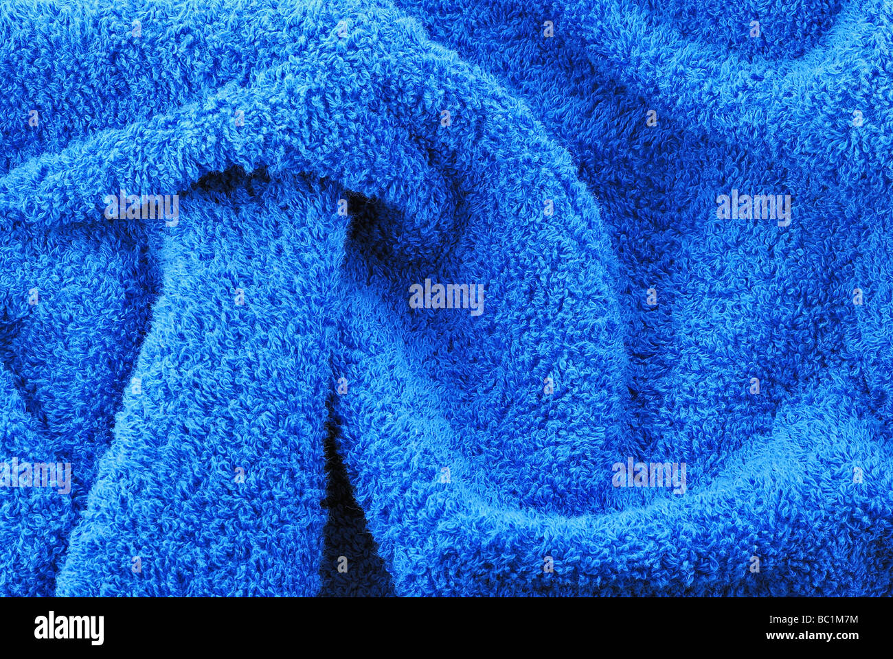 Texture blu e dettagli panno spugna asciugamano da bagno sfondo tessili Foto Stock