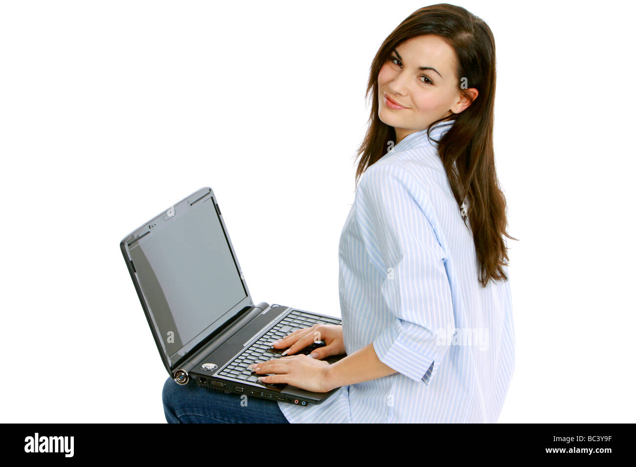 Junge Frau mit Laptop giovane donna sul suo computer portatile Foto Stock