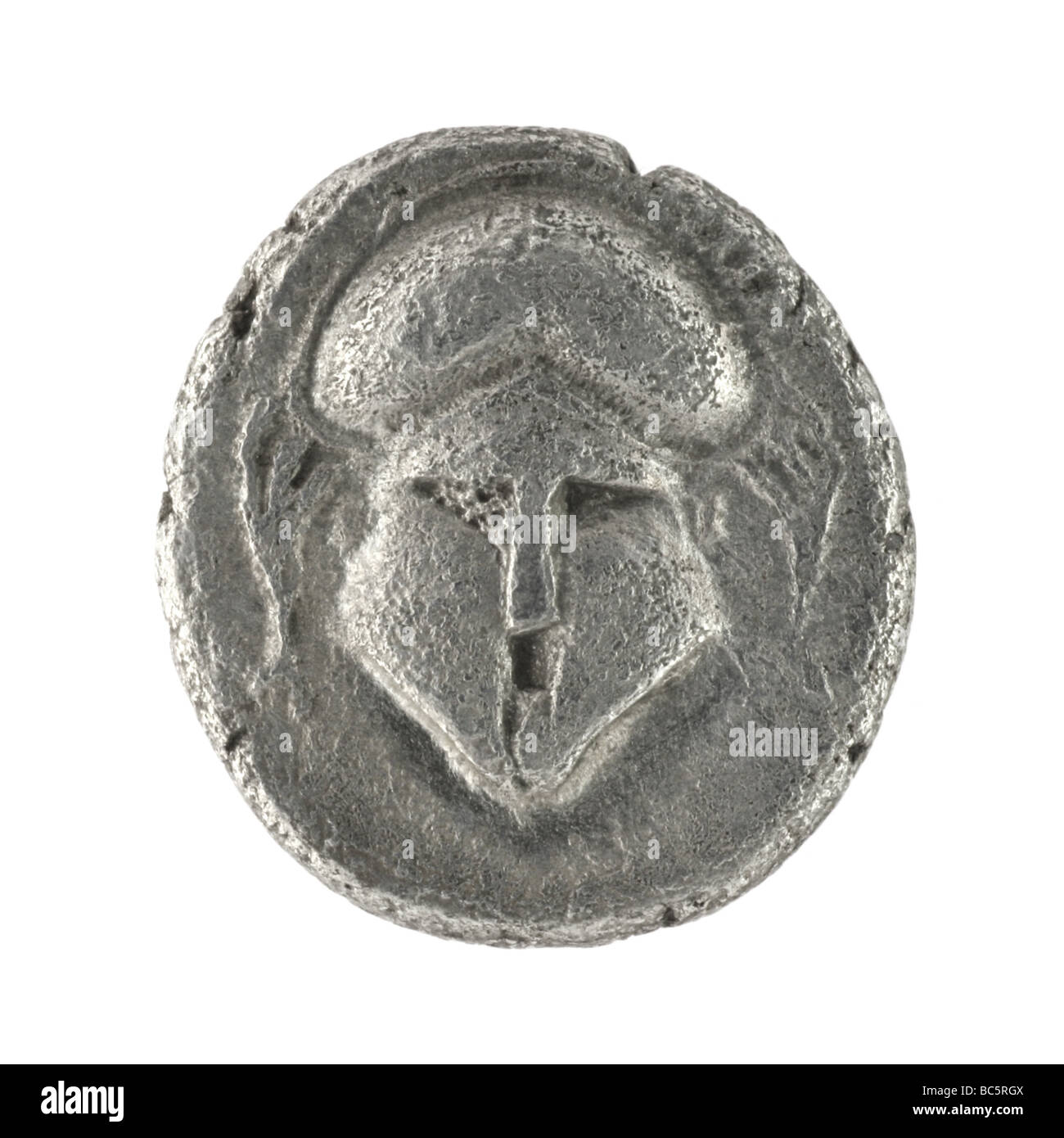 Crested casco sul Greco antico diobol dal 350 a.c. Foto Stock