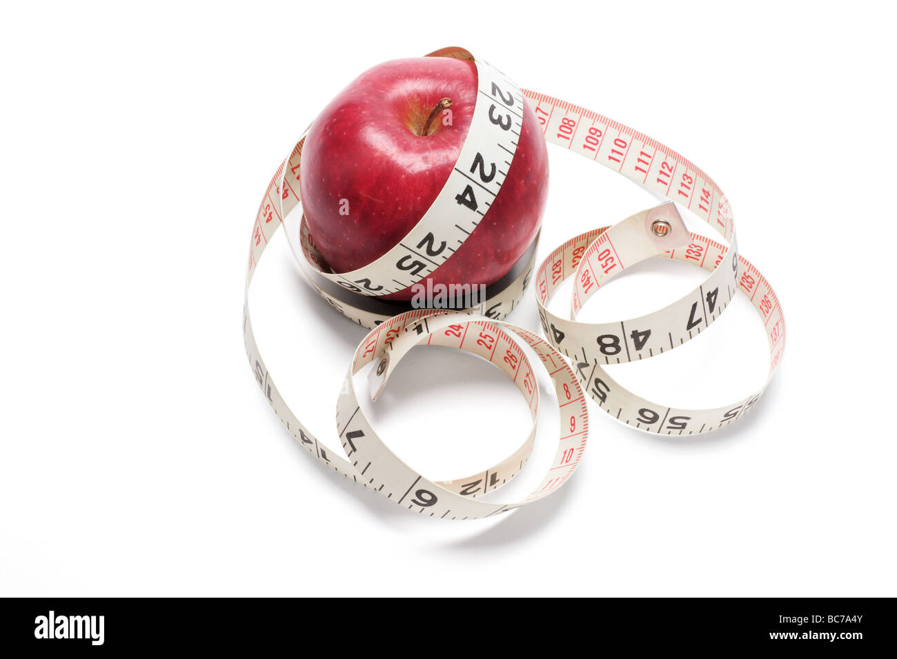 Misura nastro rosso e Apple Foto Stock