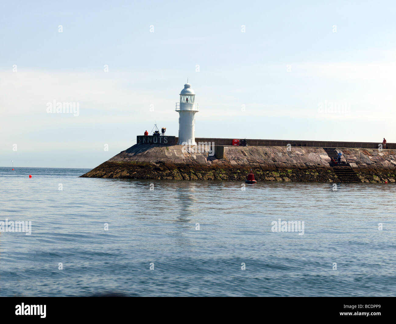 Brixham frangionde faro all'ingresso al porto,Devon. Foto Stock