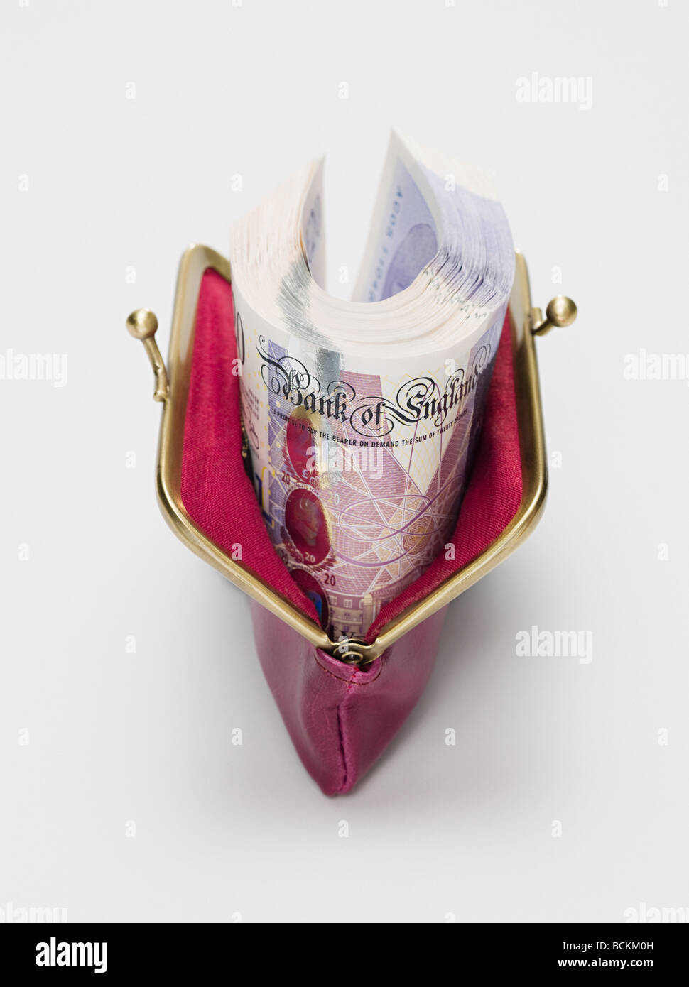 Venti pound note in una borsetta Foto Stock
