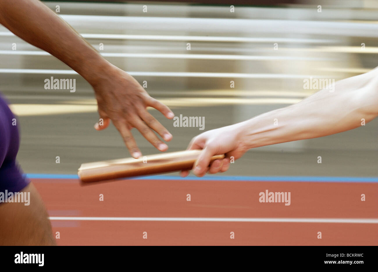 Il relè baton exchange Foto Stock