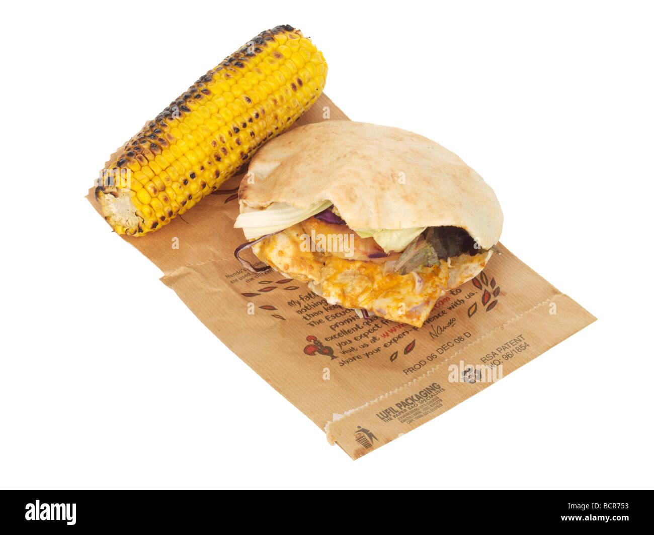 Pollo con Pitta sulla pannocchia di mais Foto Stock