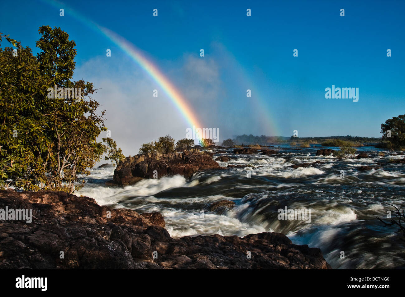 Doppio arcobaleno su Victoria Falls, Zambia Foto Stock
